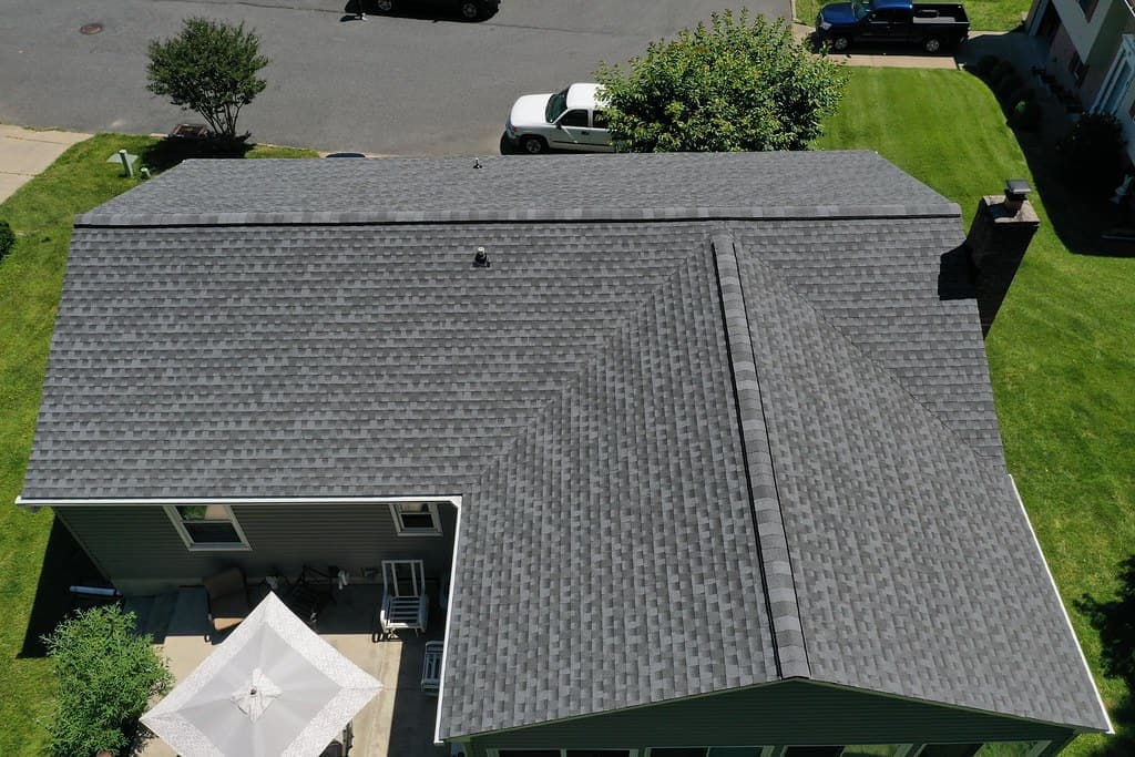 Before: Asphalt shingle to standing seam