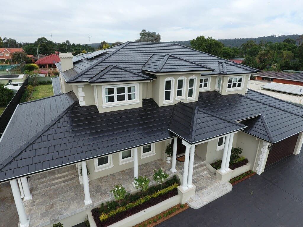 Before: Black shingle to copper