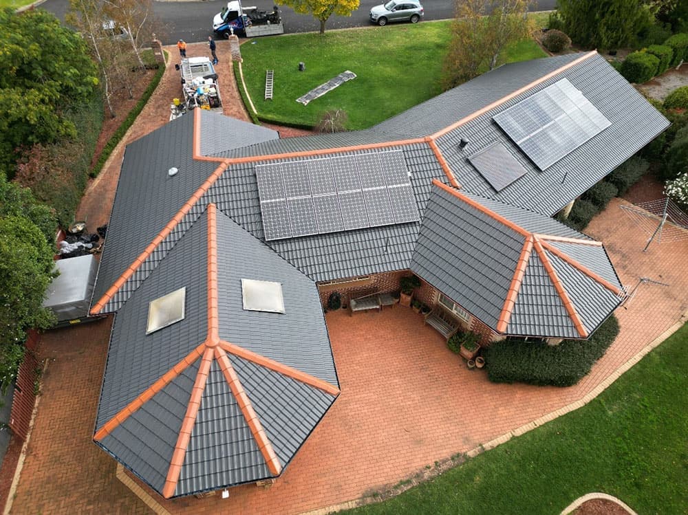 Before: Dark tile, aerial